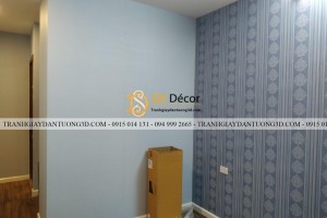 Giấy dán tường xanh 1 màu chung cư